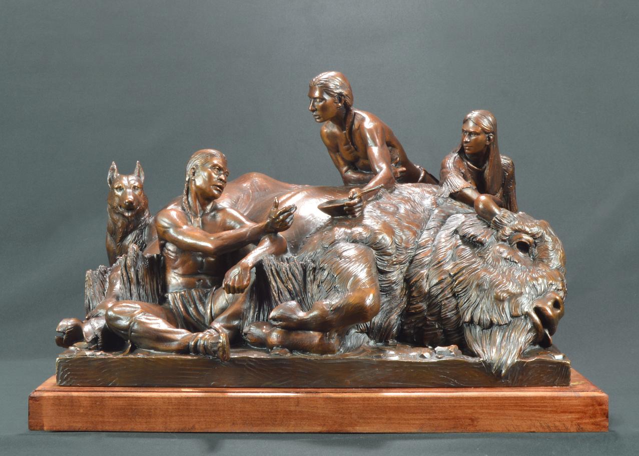 A statue of a group of people

Description automatically generated with low confidence