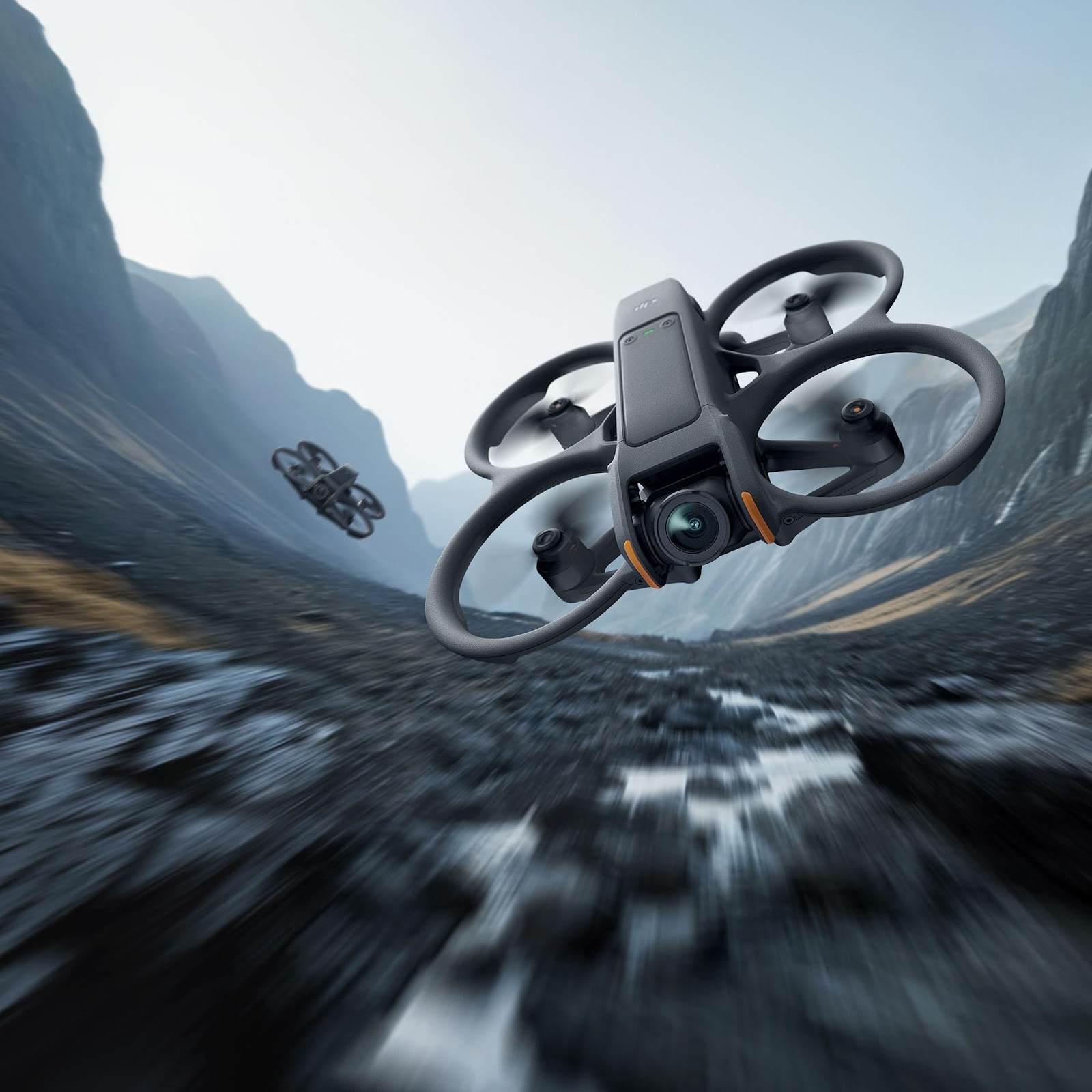 A drone flying over a rocky area

Description automatically generated