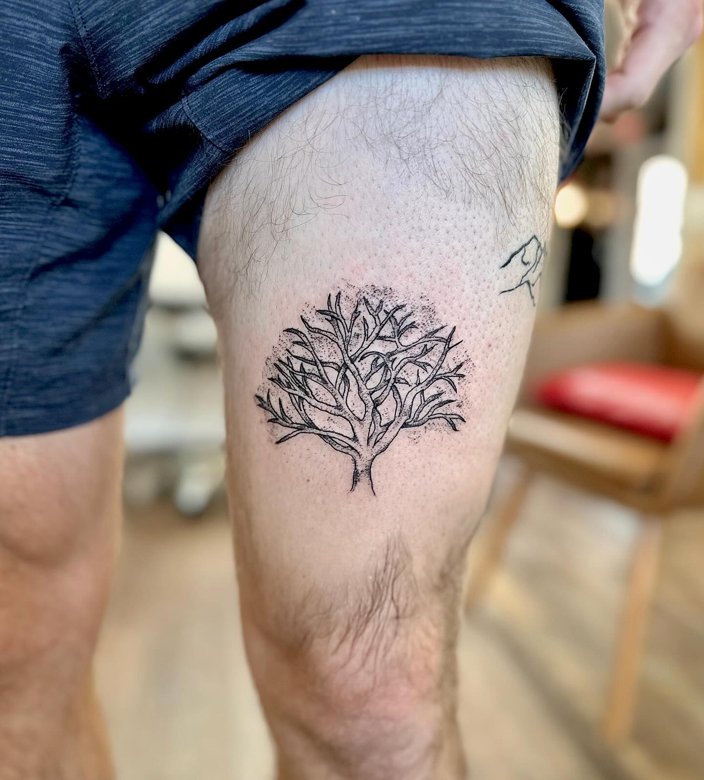 Majestic Tree Thigh Tattoo