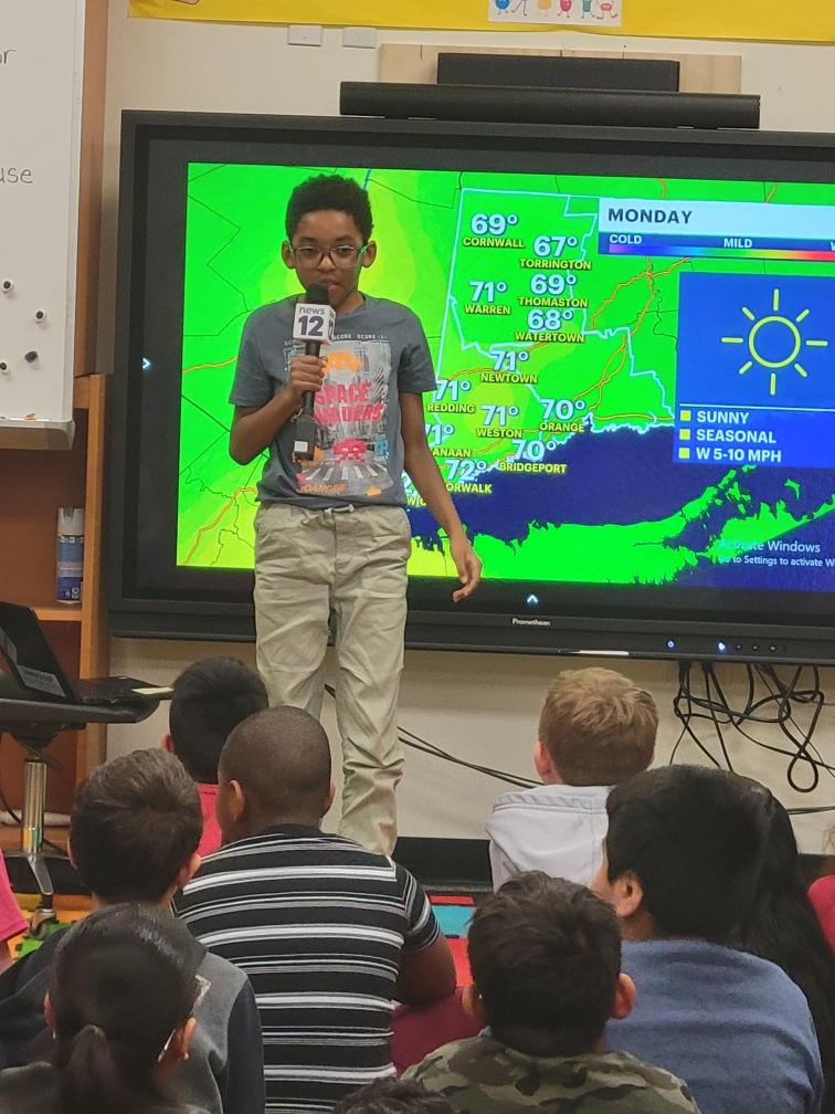 Students broadcasting the weather
