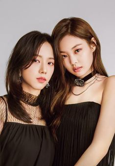 This contain  an image of BLACKPINK Jennie Jisoo  in black dresses posing for the camera with their arms around each other