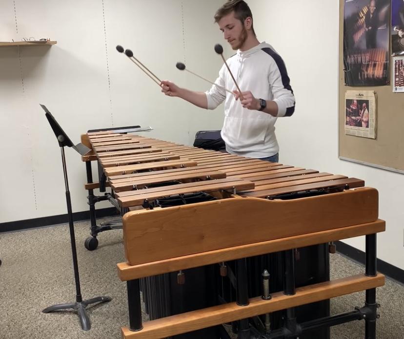 A person playing a xylophone

AI-generated content may be incorrect.