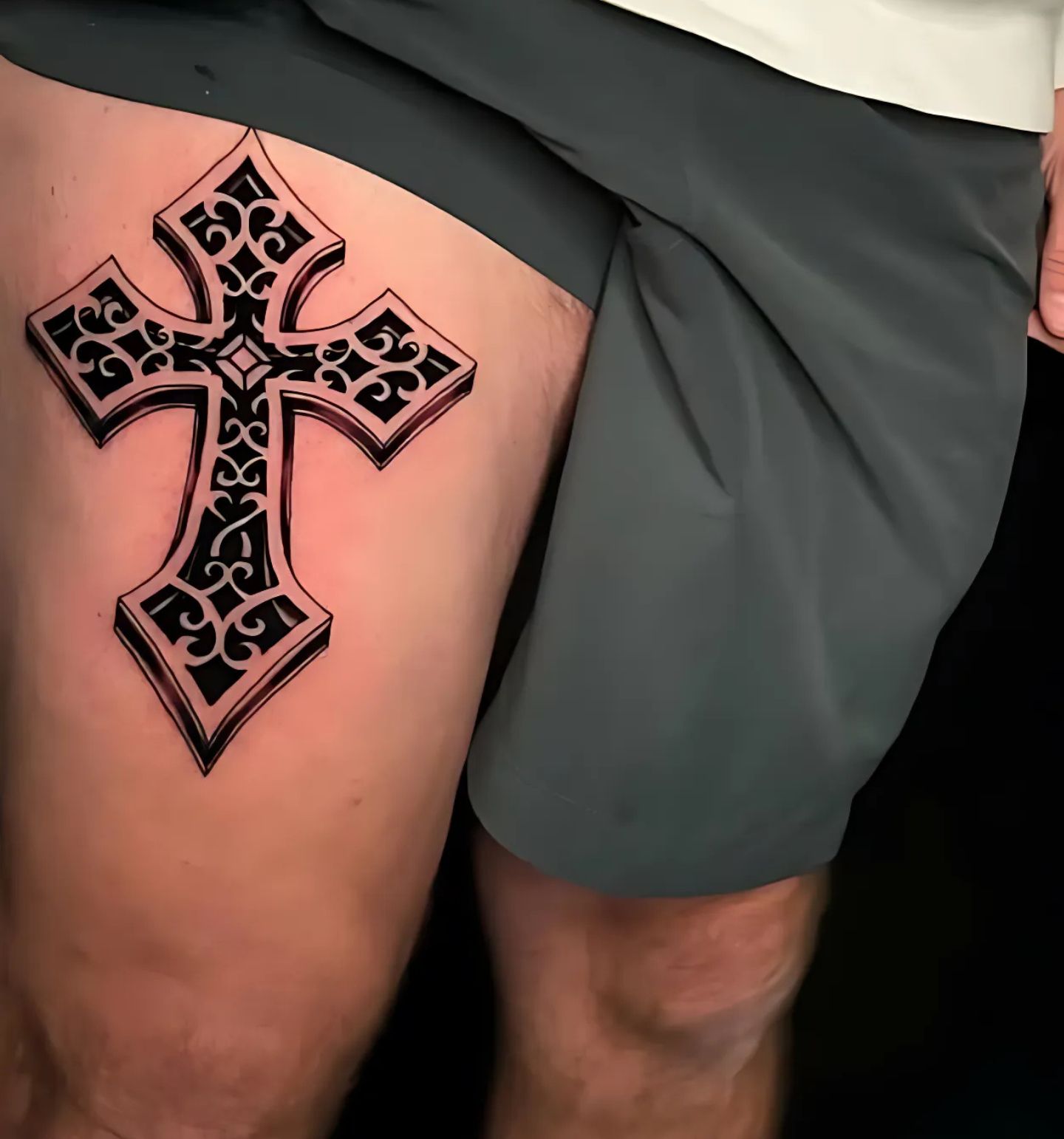 Cross Thigh Tattoo