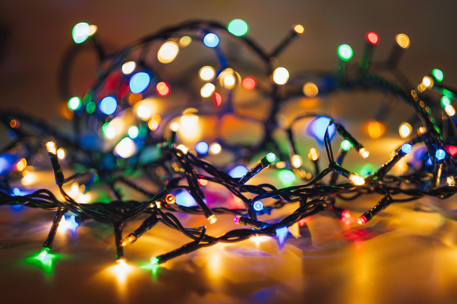 Colored string Christmas lights, commonly used for decorating trees.