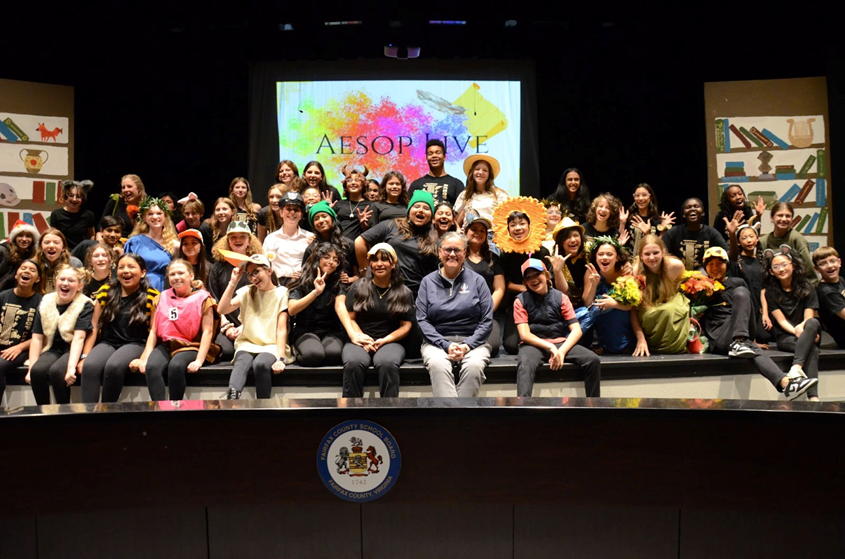 Dr. Reid with the cast of Aesop Live! at Luther Jackson Middle School. 