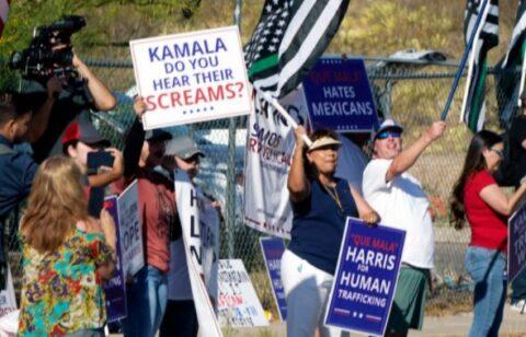 A group of people protesting

Description automatically generated