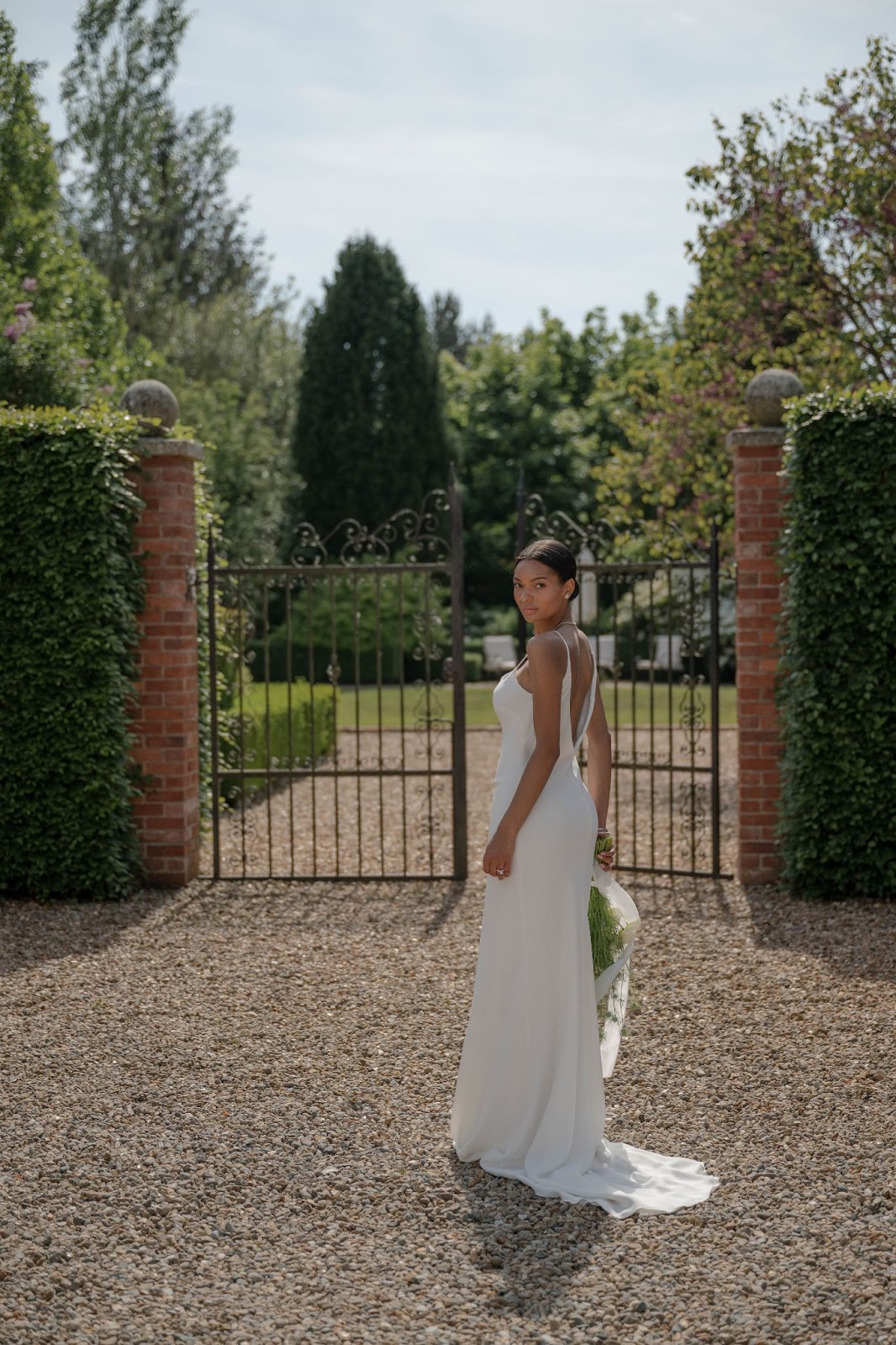 White wedding gown by Rolling in Roses