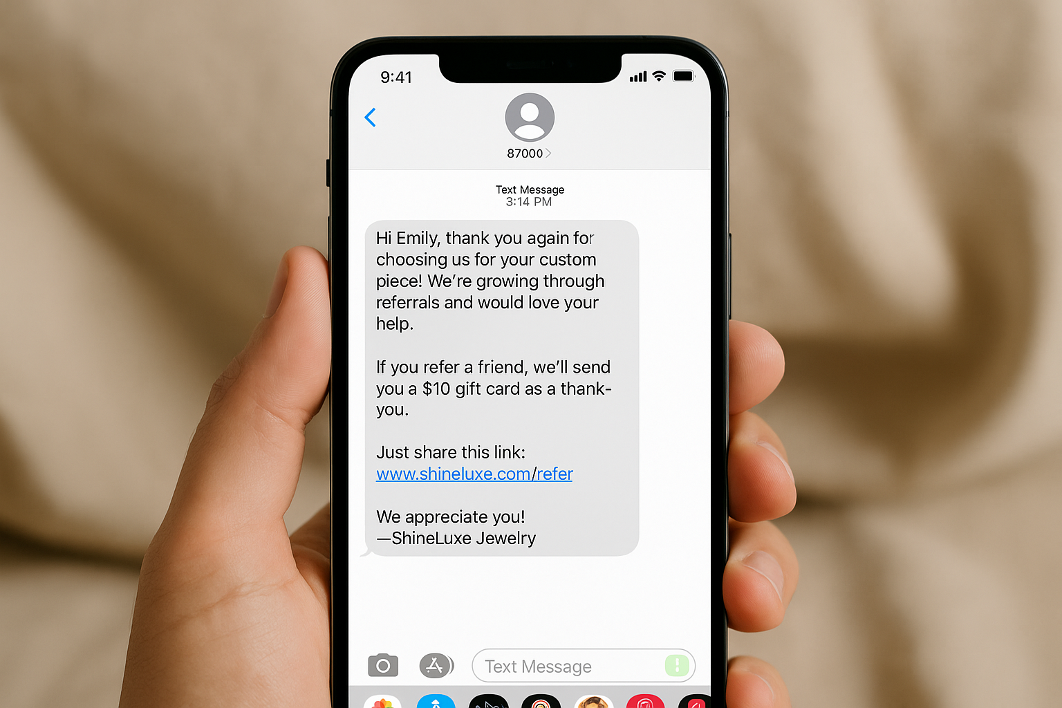 Person reading a text message about a referral