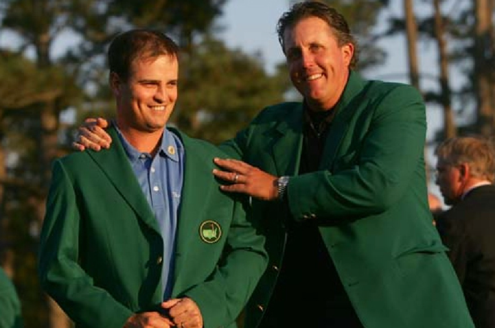 A couple of men in green jackets

Description automatically generated