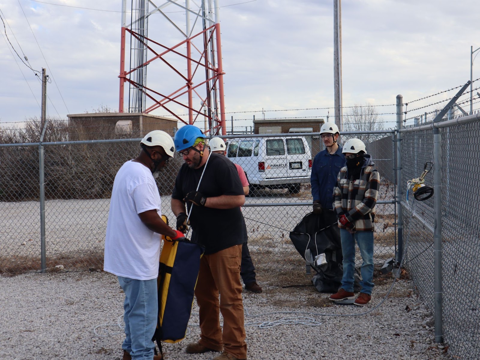 Pinnacle Career Institute Wind Turbine Technician Program students at the out door climbing lab