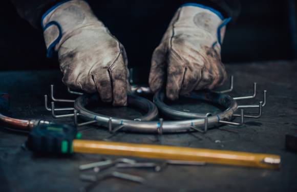 welder forming metal object