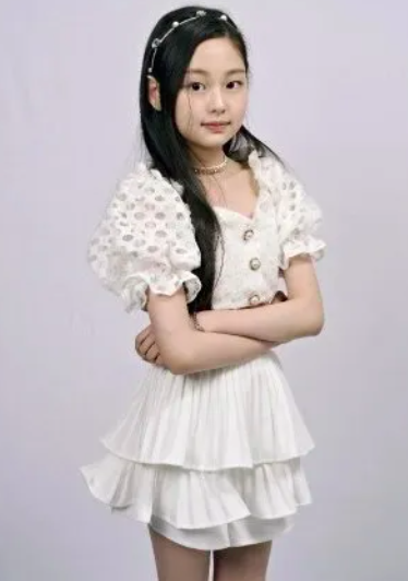 This contain an image of Jung Choha, on white outfit 