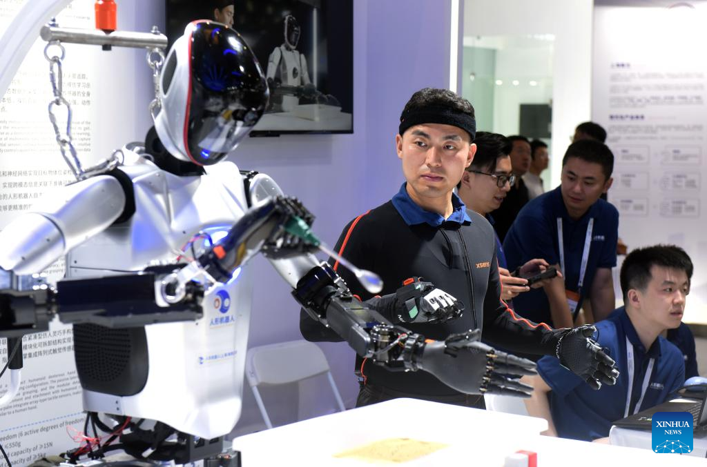 Man controlling robot hands – Robotics and future of AI