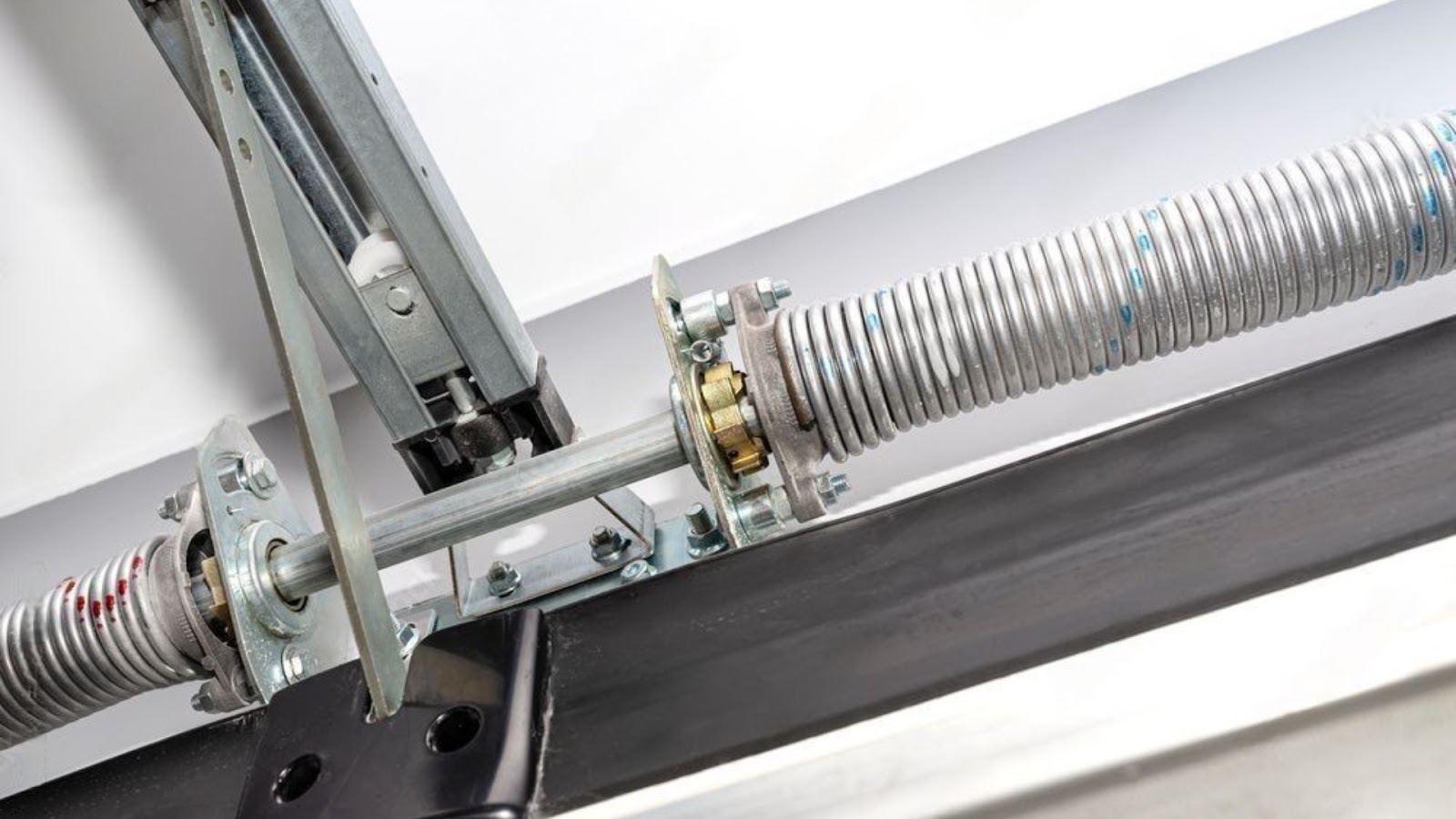 A torsion spring installed in a garage door system