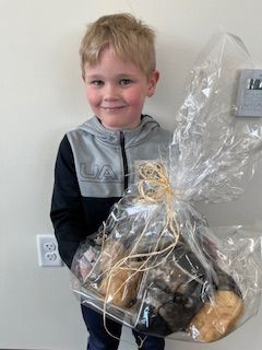 Haaken holding a prize