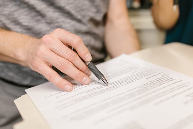 person reading through documents