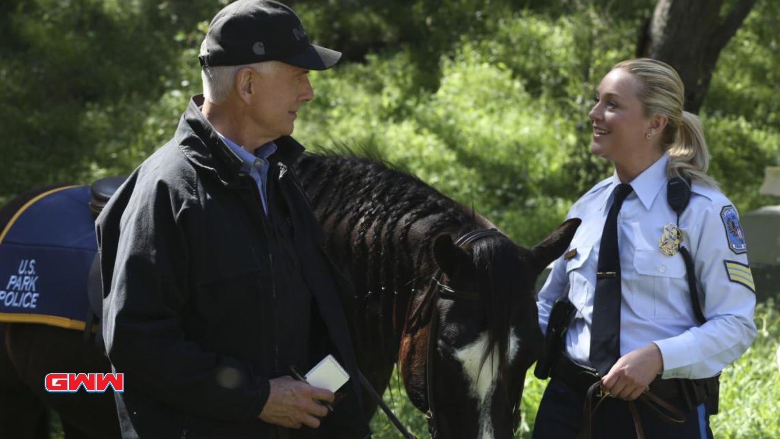 Leroy talking to park officer May with a horse.