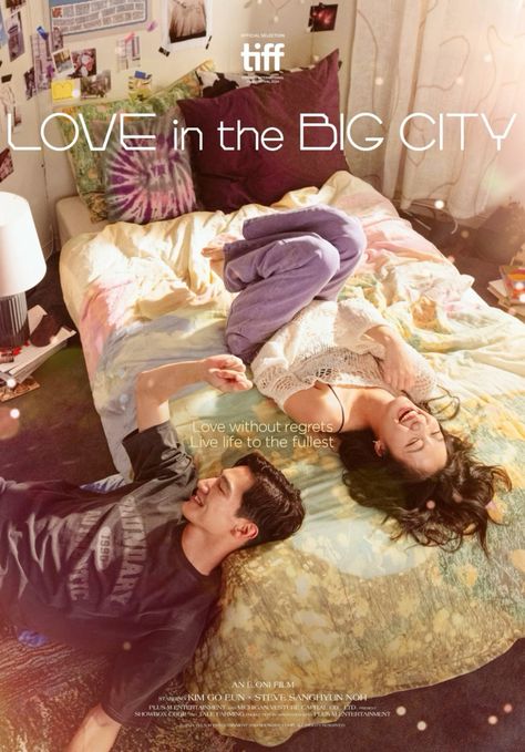 This contain a poster for love in the big city shows two people laying on a bed together