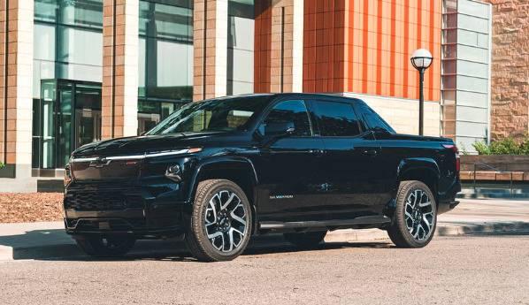 A black truck parked in front of a building

AI-generated content may be incorrect.