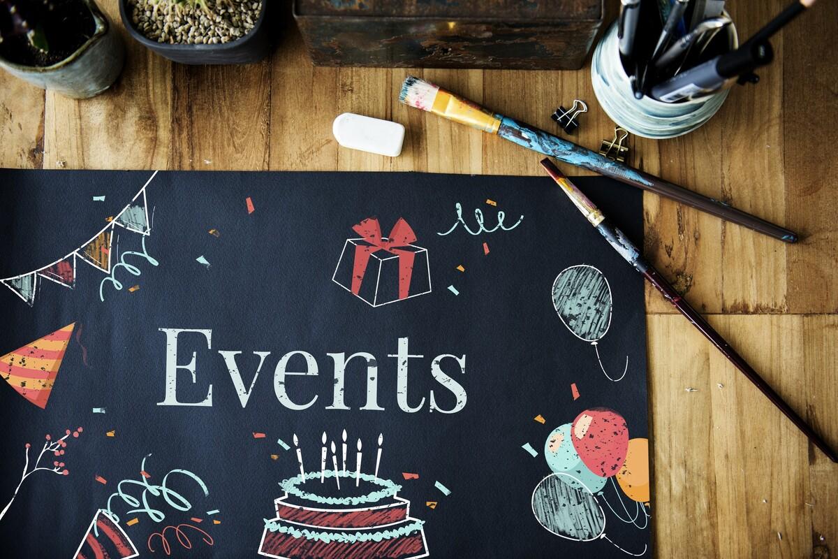 Event essentials like balloons and confetti drawn on cardboard
