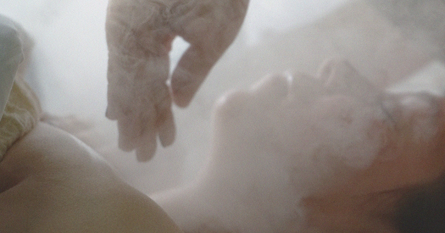 woman having steam facial