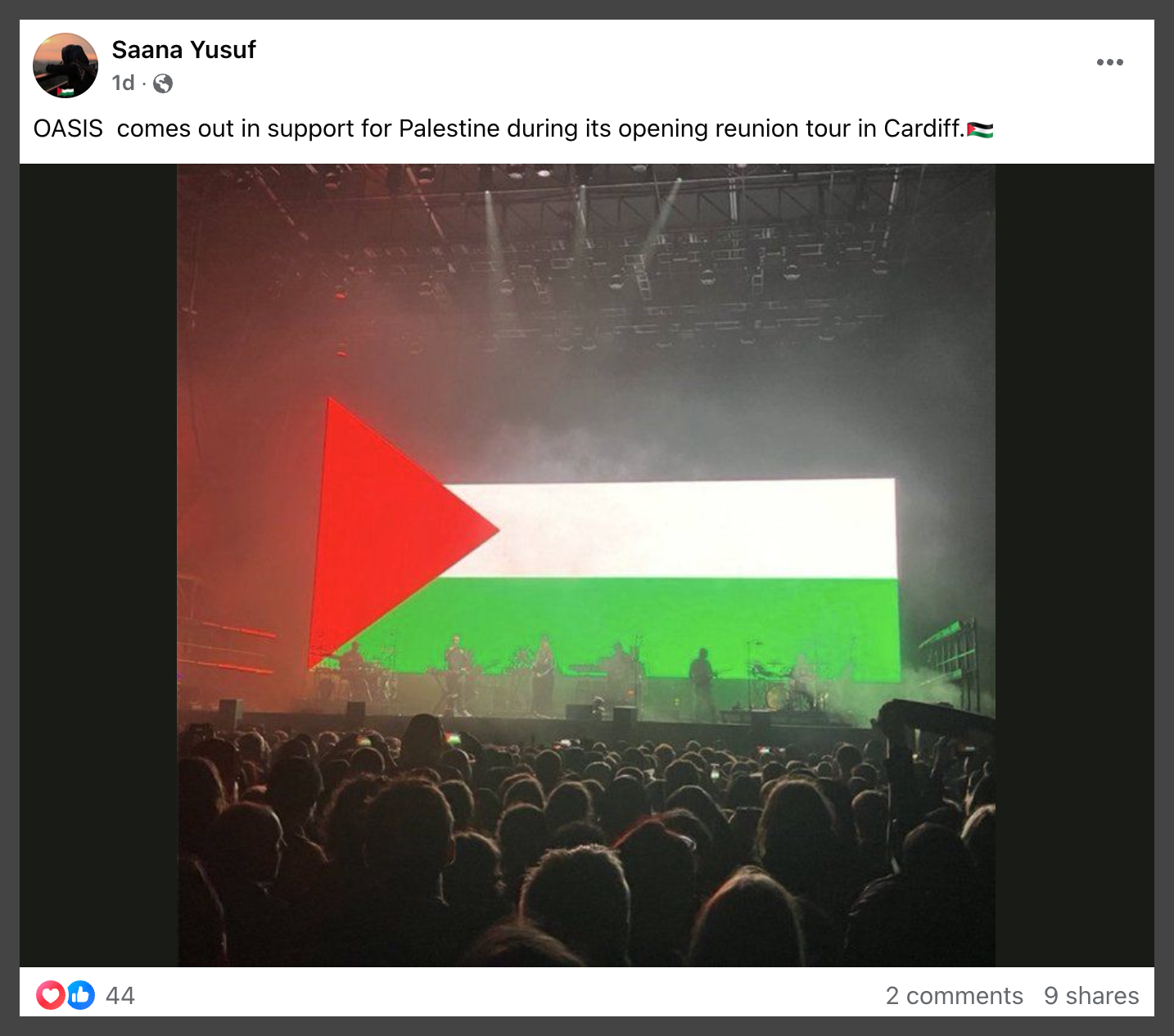 A group of people on stage with a flag

Description automatically generated