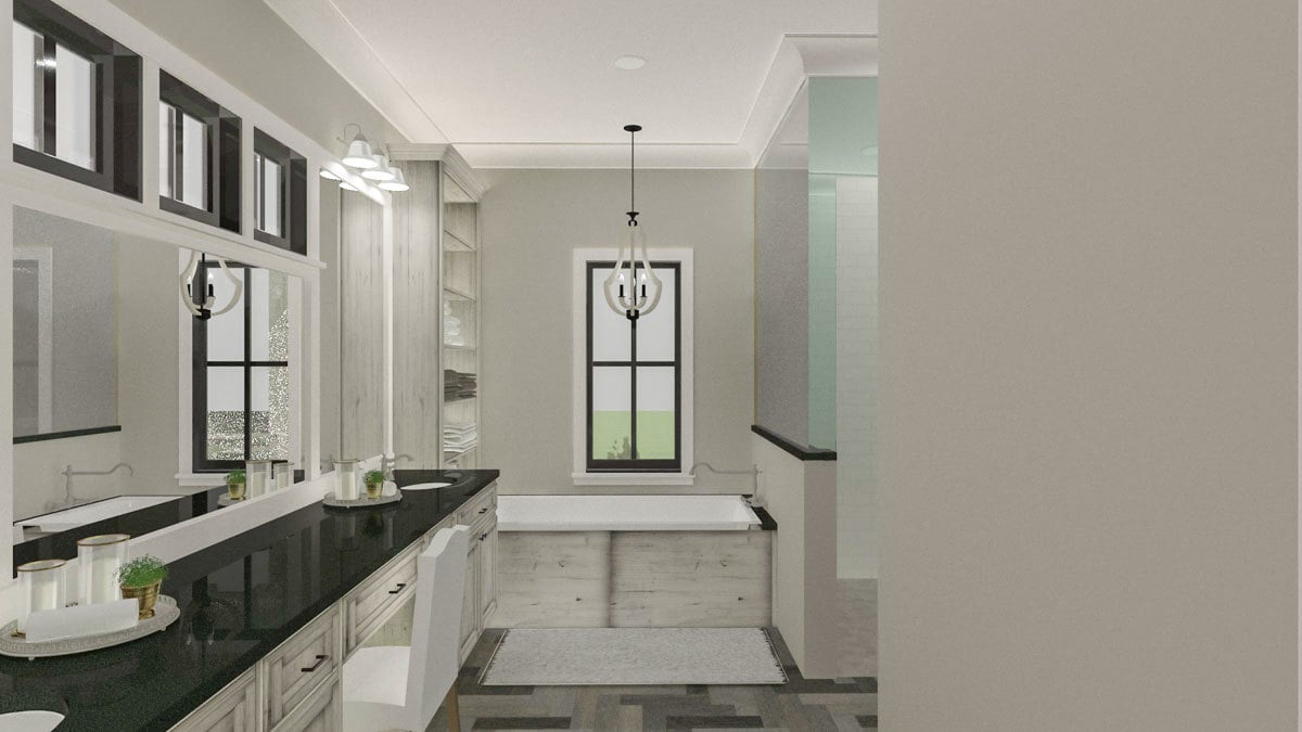 The primary bathroom offers a dual sink vanity and a deep soaking tub illuminated by a nice drop light.