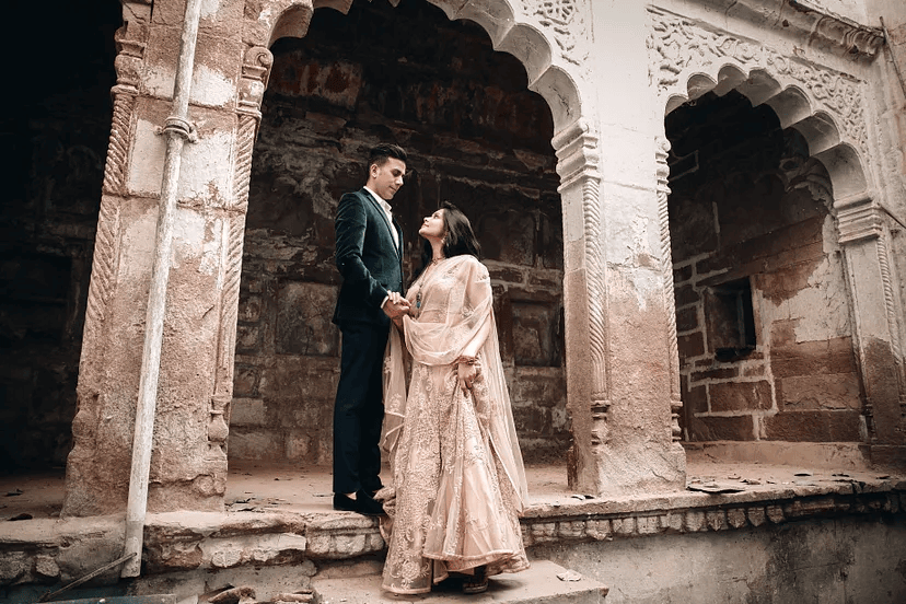 Authentic pre-wedding photography in Jodhpur, showcasing a couple’s bond with hand-holding poses.