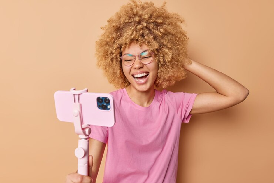 https://www.freepik.com/free-photo/joyful-curly-haired-woman-uses-selfie-stick-smartphone-taking-pictures-laughs-happily-wears-spectacles-casual-pink-t-shirt-isolated-beige-background-joyful-female-photographs-herself_25908407.htm#fromView=search&page=1&position=30&uuid=7fef7814-e4ae-442e-aa9e-fbbace204286&query=tiktok 