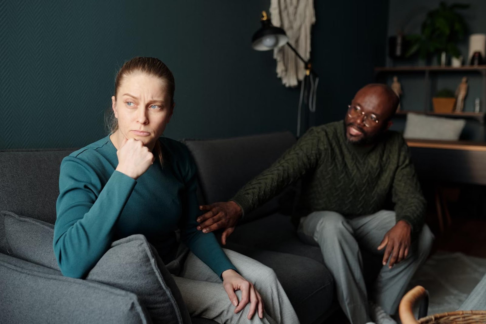 woman ignoring man speaking to her