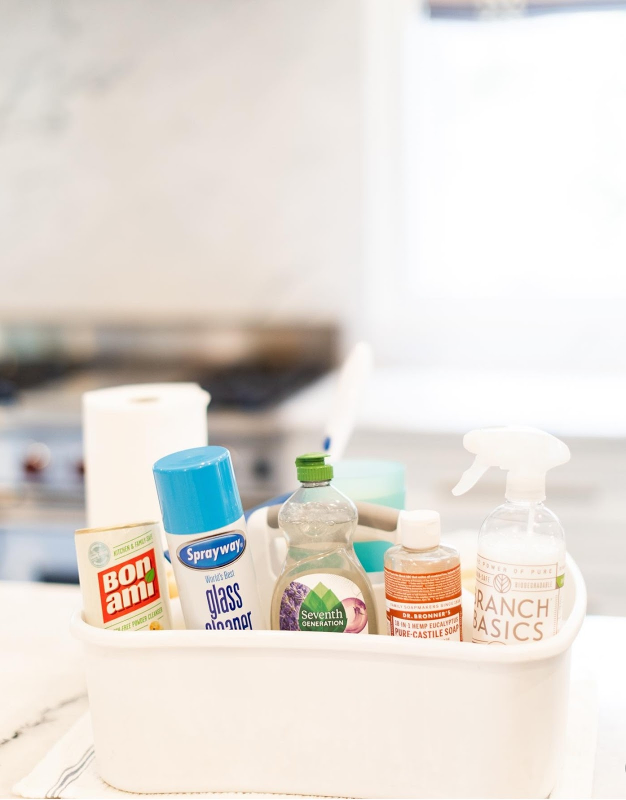 An assortment of eco-friendly green cleaning solutions Vella uses to clean Texan homes.