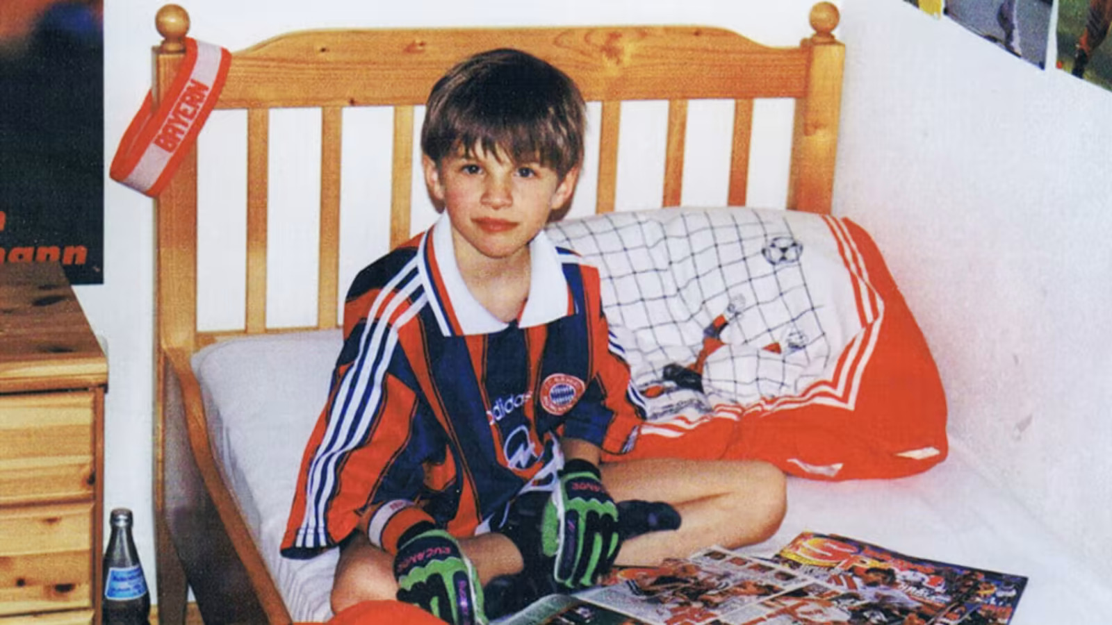 Thomas Muller wearing the Bayern Munich kit as a child