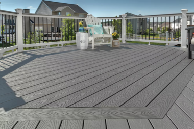 benefits of hiring a trexpro platinum installer for your deck build trex select pebble grey composite decking with adirondack custom built michigan