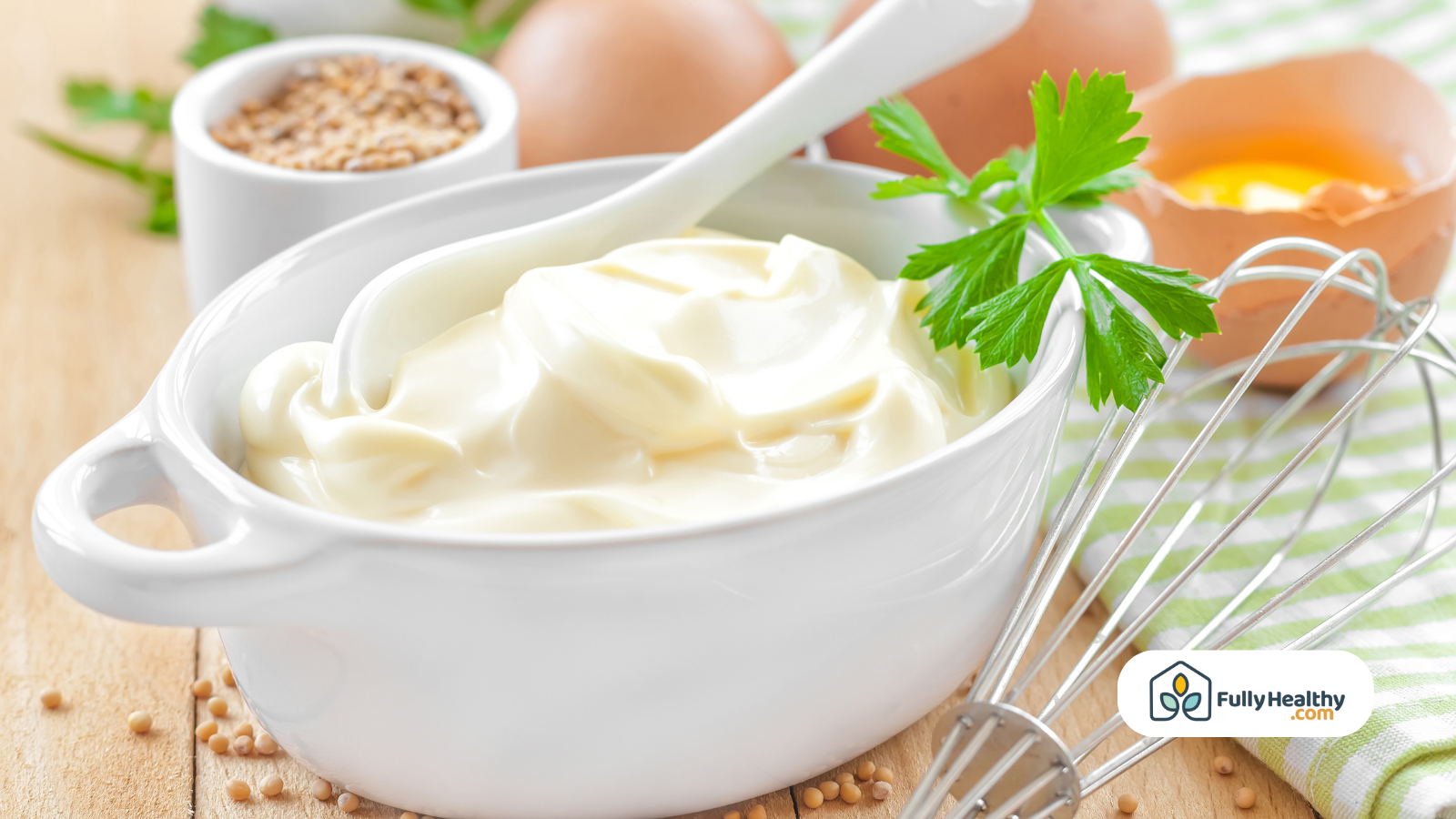 Fresh homemade mayonnaise with parsley and egg in background