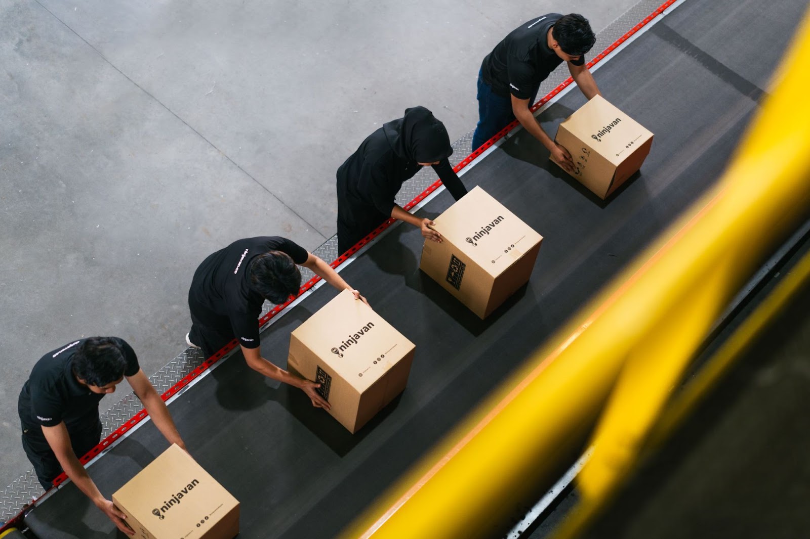 Efficient order picking and sorting at Ninja Van’s fulfillment center for FMCG products.