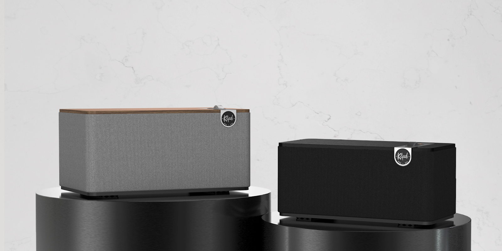 Klipsch The One Plus in Walnut and Matter Black color options.