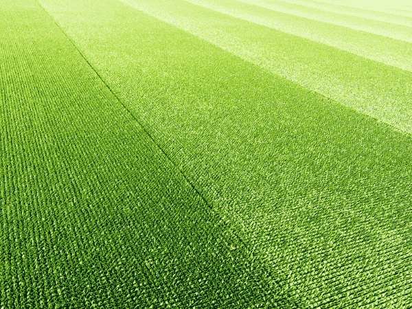 Close-up view of artificial turf surface showing even texture and infill coverage for proper turf performance.