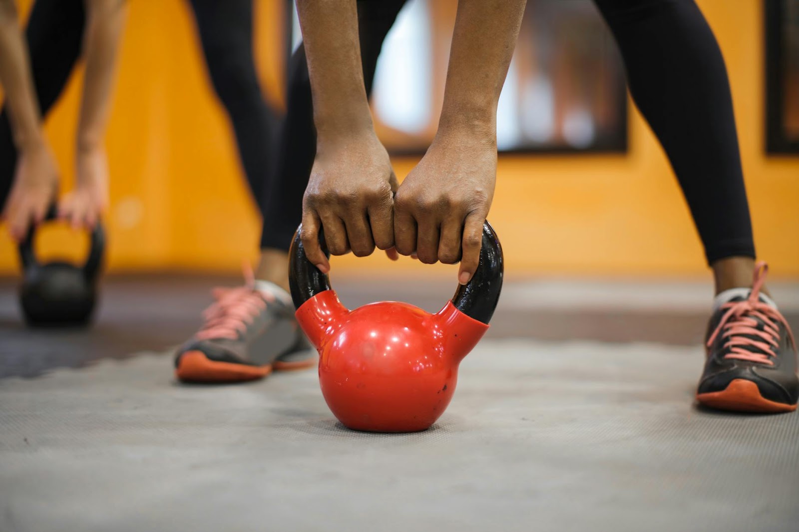 https://www.pexels.com/photo/people-holding-a-weights-3766211/