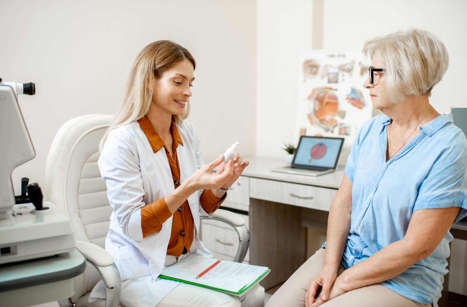 An optometrist explains the importance of checking for expiry dates on eye drops to their patient.