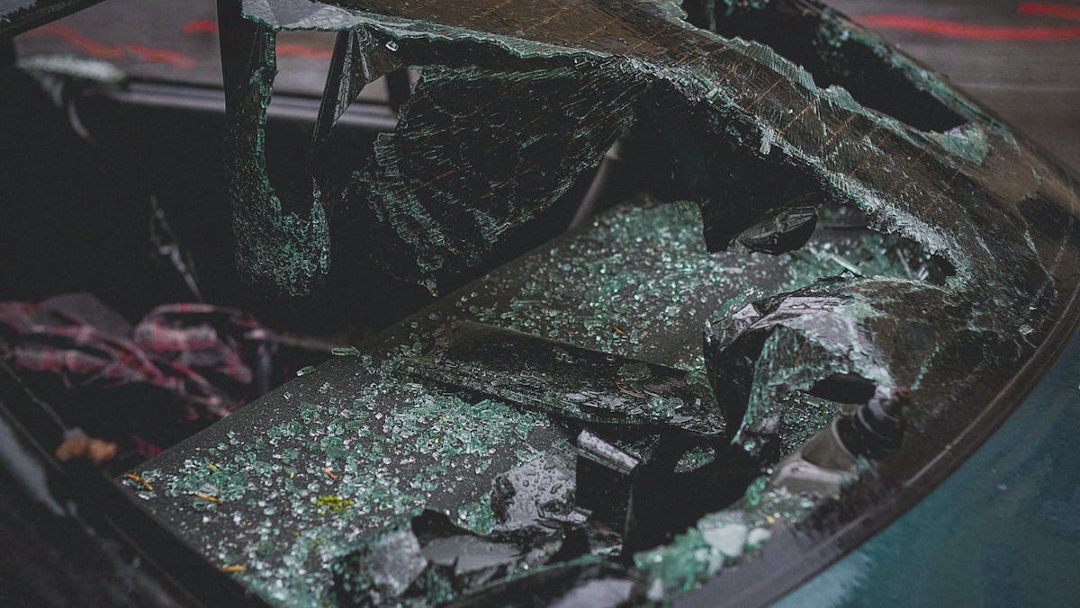 crashed car with a broken windshield