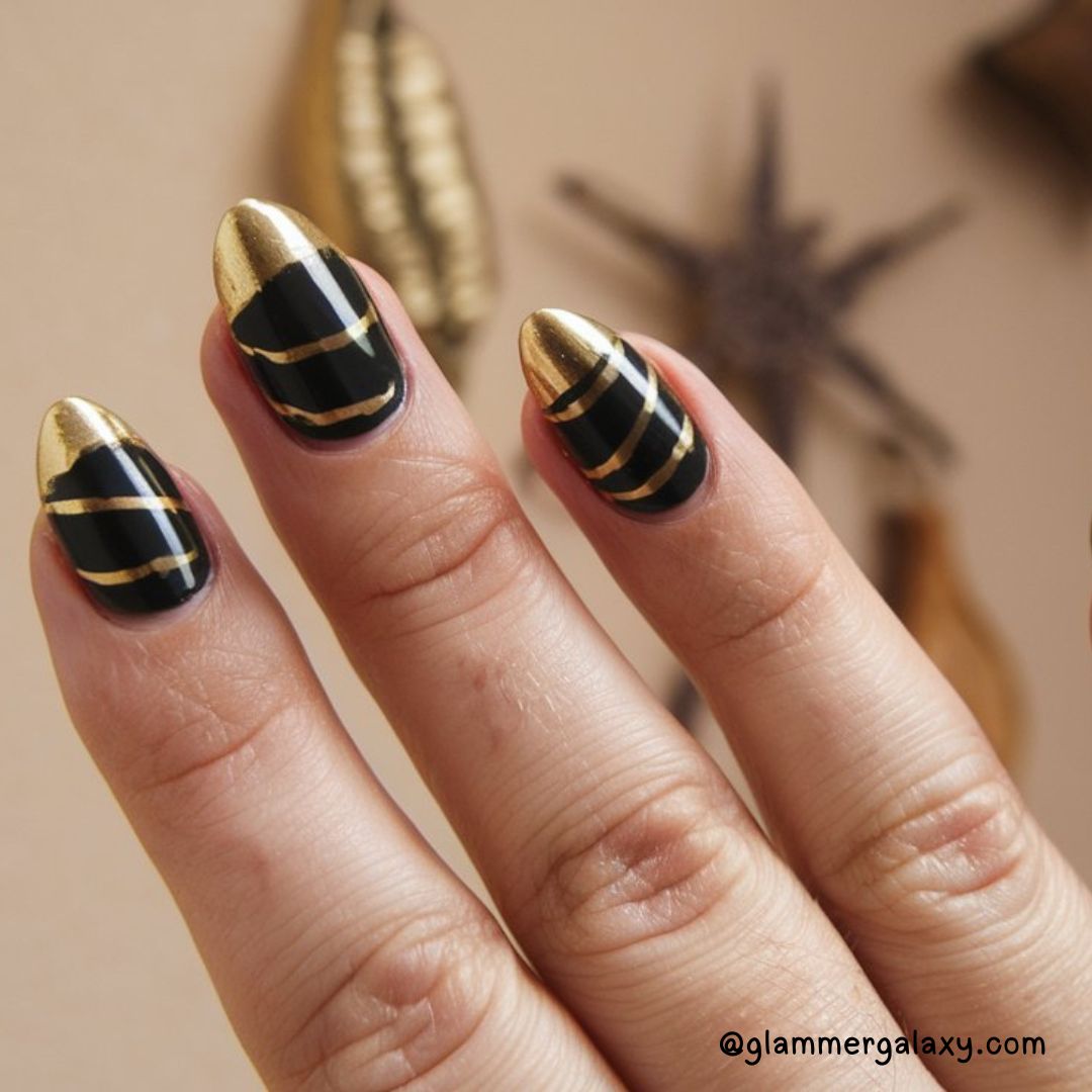 Bold Fall Nail Art Designs Having Black and Gold Fall Manicure
