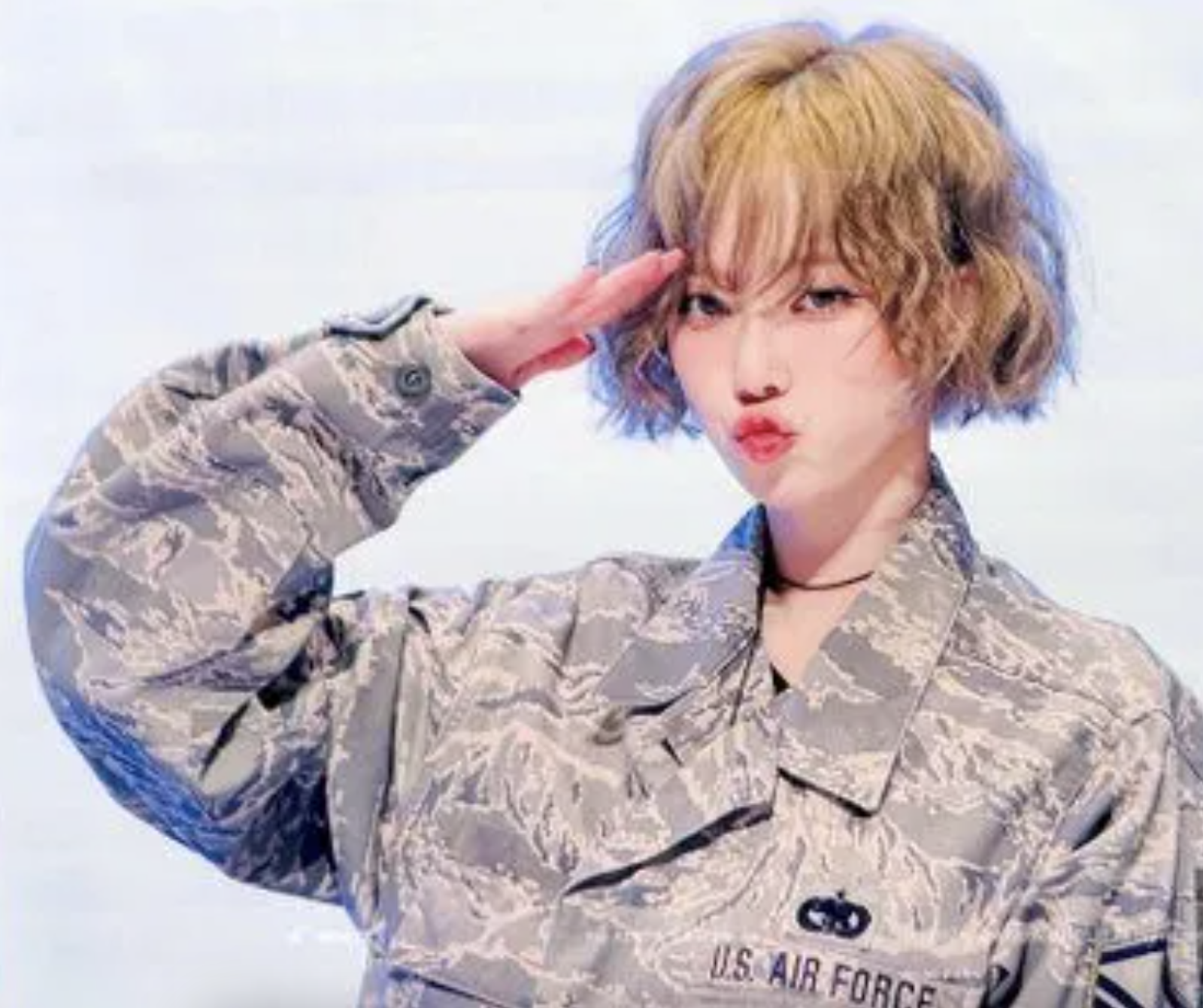 A picture of Winter Aespa on a army outfit and a short blonde hair saluting 