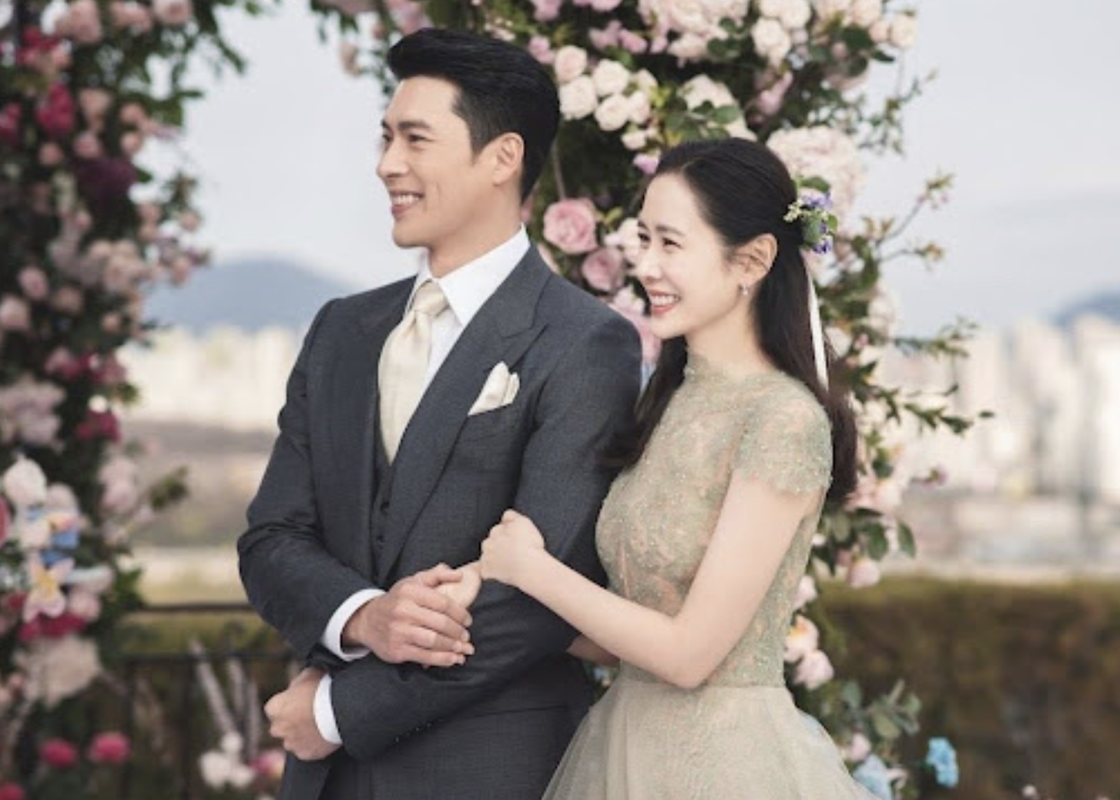 A picture of Hyun Bin' and his wife 