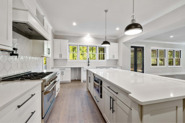 how much do kitchen islands cost long countertop space with lamp fixtures and luxury range custom built michigan