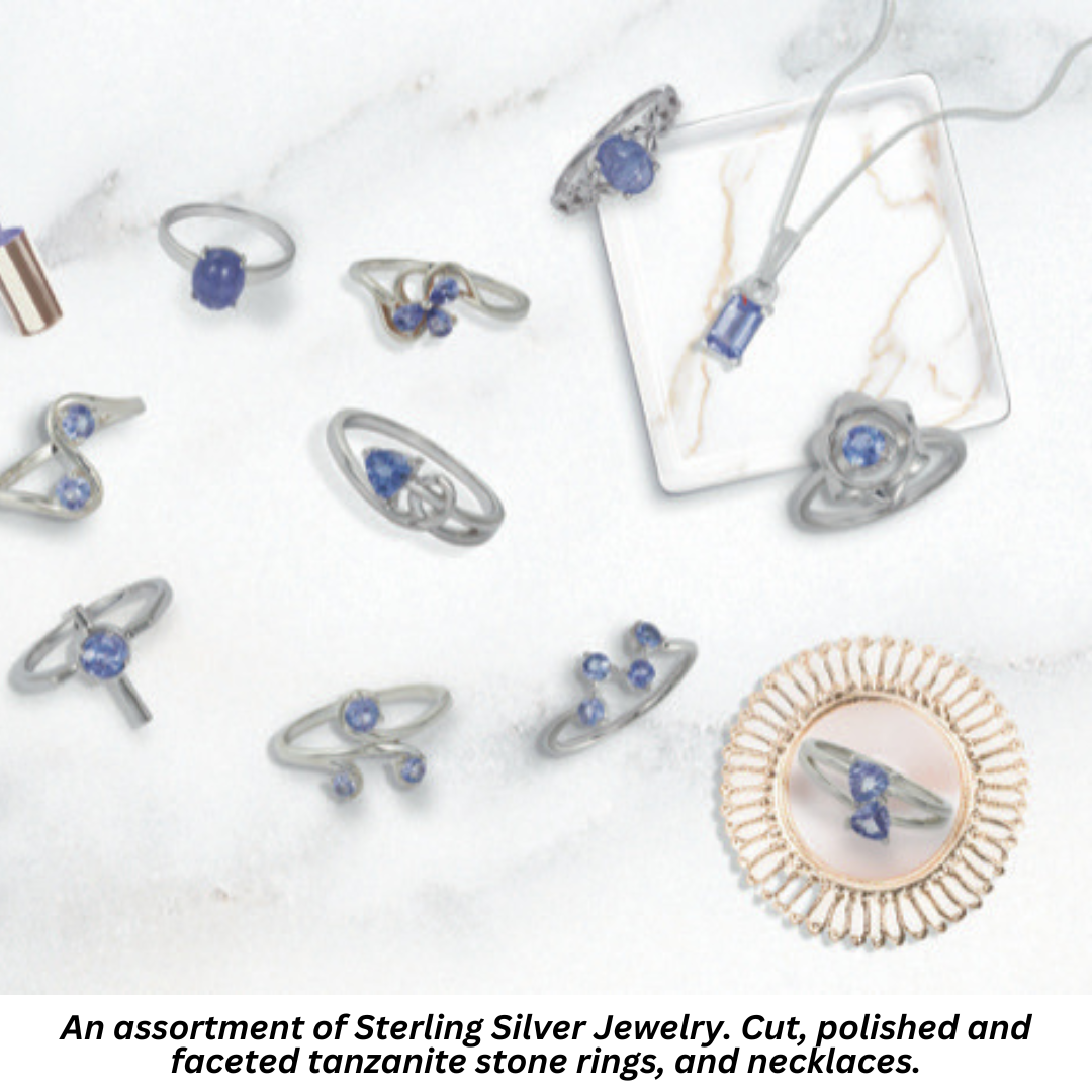 An assortment of Sterling Silver Jewelry. Cut, polished and faceted tanzanite stone rings, and necklaces.