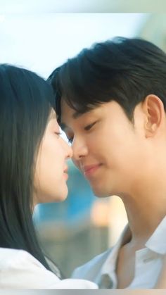 This contains an image of Actor Baek Sung Hyun and his wife looking each other in  and they are in white cloths.