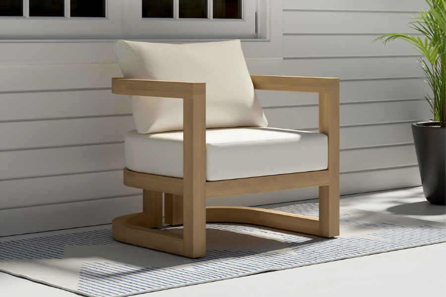 Sarpa Acacia Wood Outdoor Patio Club Chair featuring a modern angular frame, Linen White weather-resistant cushions, and a natural teak-toned finish—perfect for contemporary patio relaxation with lasting durability.