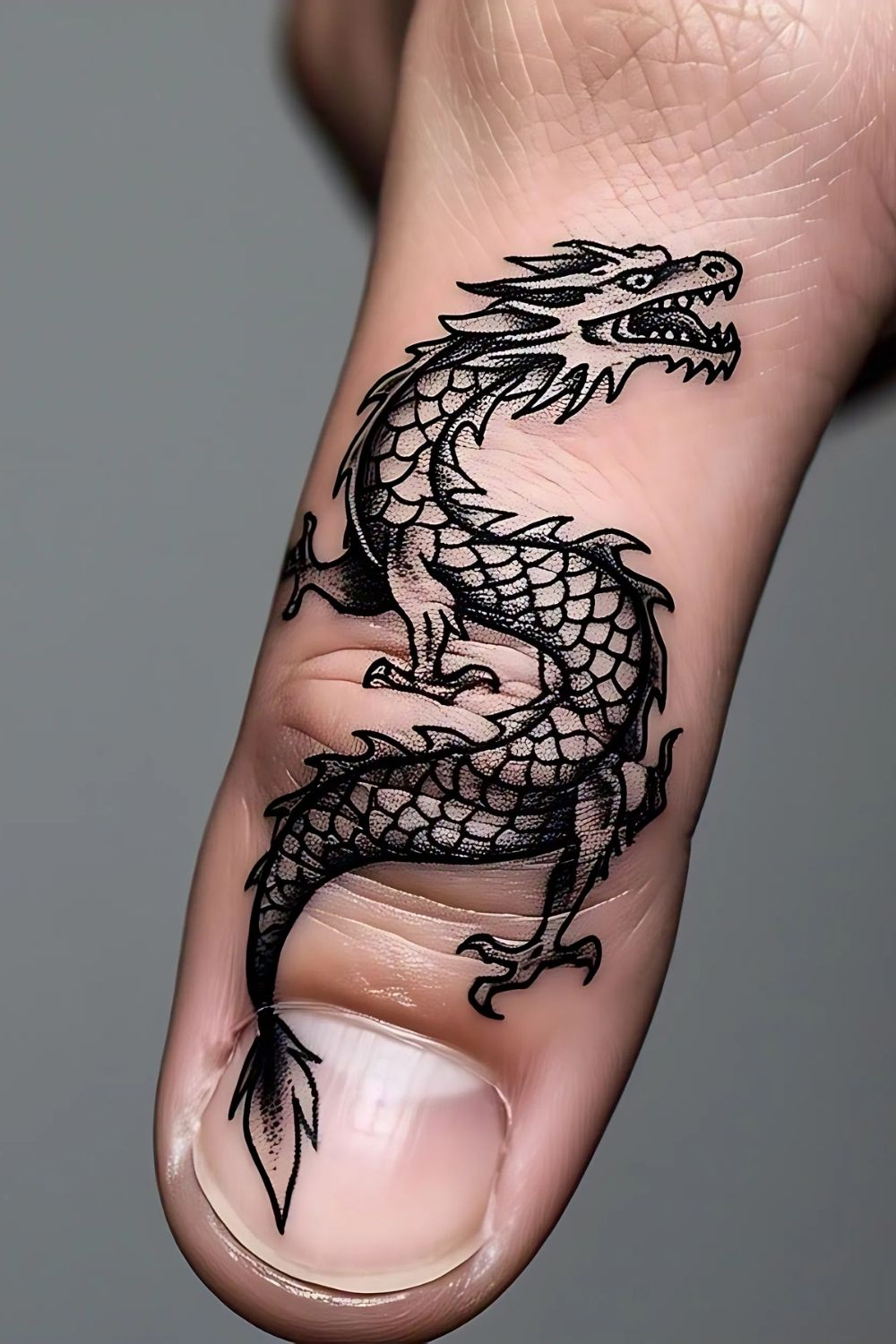 Fierce Dragon Finger Tattoo