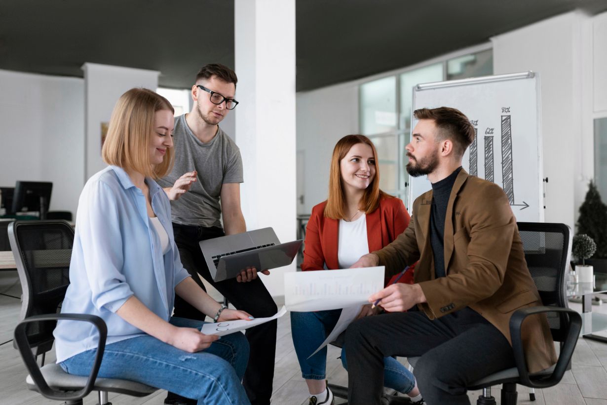 https://www.freepik.com/free-photo/group-coworkers-office-talking_14667004.htm?log-in=google