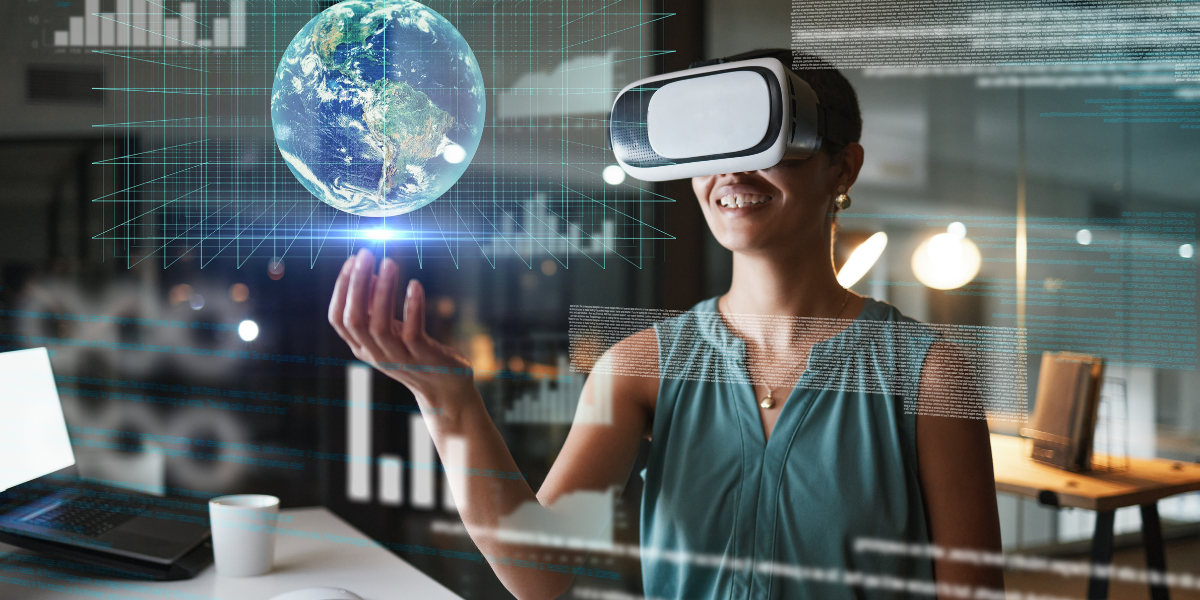 A woman with a virtual reality headset smiling while holding a globe in her hand.